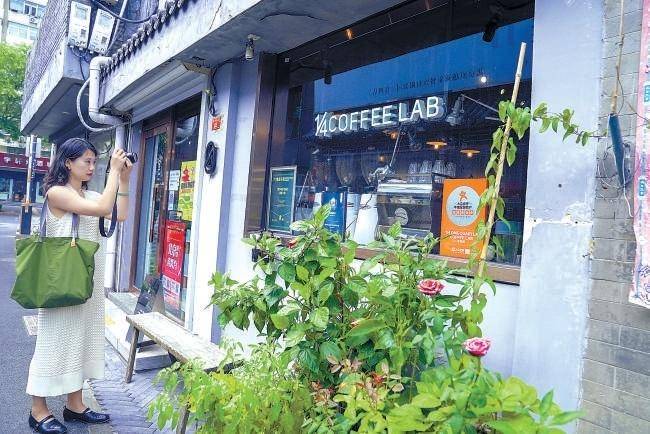 中国最新动态，小巷深处的独特风情小店揭秘